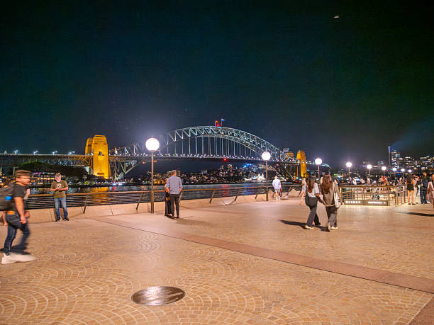 11 October 2025 Harbour Bridge at Circular Quay on Sydney Harbour illuminated at night on a spring cool night in Sydney NSW Australia