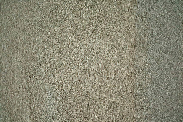 oyster color rough texture surface of concrete wall of outdoors use to interior background