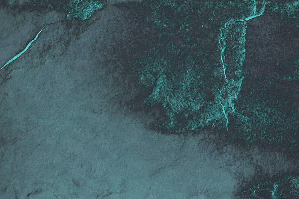 istock Luxury Plankton glows blue on countertops granite texture 2240564758