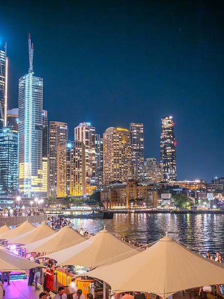 11 October 2025 Sydney Circular Quay at night on Sydney Harbour illuminated at night on a spring cool night in Sydney NSW Australia