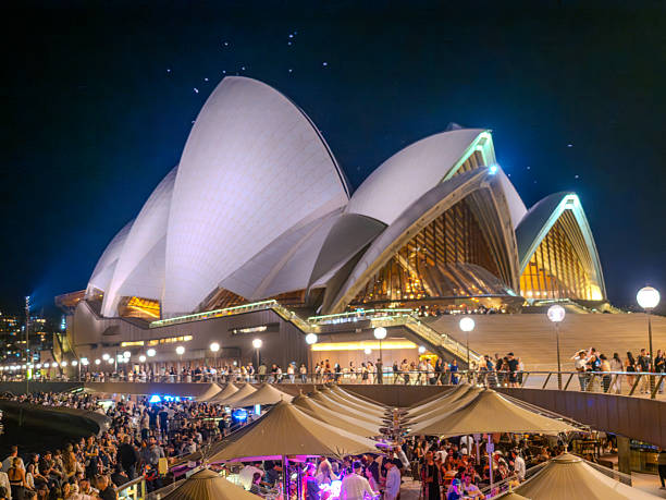 View of Sydney Opera House at night, a multi-venue performing arts centre in Sydney harbour - New South Wales, Australia