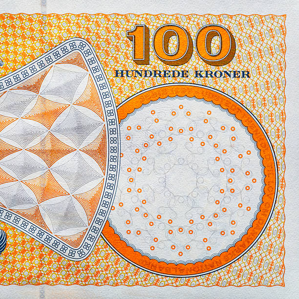 istock Denmark 100 Kroner 2003.Composer Carl Nielsen (1865-1931)Basilisk from Tommerby Kirke.Basilisk means little king; stylised ornamental cross.World money collection.Bonistics.Collection. 2240570340