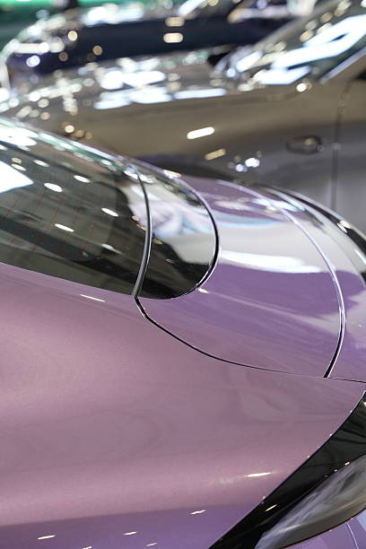 A row of rear trunk covers for cars\nbackground