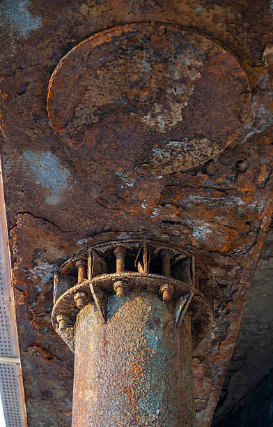 istock Rusty pillar at a harbor-port - Degraded city 2240576368