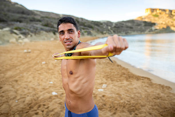 The man in thermal foam does water sports in the sea