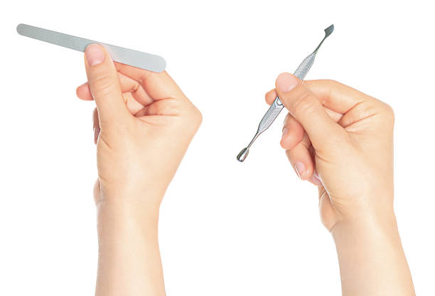 istock Set of hands holding manicure tools, isolated on transparent background 2240578257