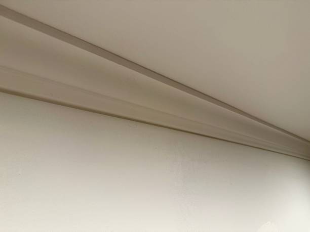 istock Ceiling moldings in the interior, intricate corner 2240578827