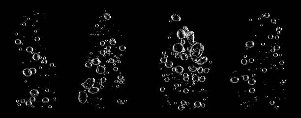 istock Abstract close-up of transparent water bubbles rising on black background, symbolizing freshness, clarity, and clean energy. Perfect for science, nature, or eco-friendly product design concepts. 2240579092