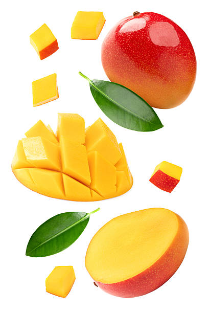 istock flying mango with slices and green leaves isolated on white background. clipping path 2240580574
