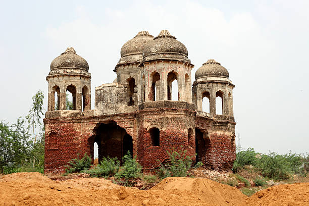 An ancient building stands outdoors in Haryana, India, showcasing historical architecture and traditional design. The scene highlights cultural heritage, rustic charm, and the enduring presence of historic structures in rural and urban landscapes of India.