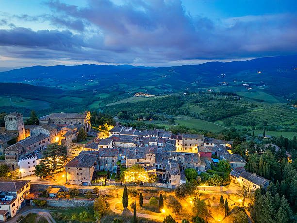 istock Panzano in Chianti at dusk, Tuscan town from drone 2240587139