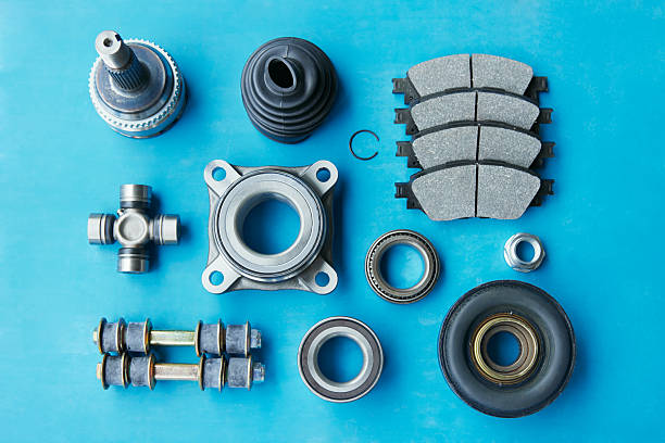 Top View Mechanical Engineering or Industry Concept by Ball Bearing and Auto Part CV Joint, Universal Joint, Rubber Bushing and Brake Pads