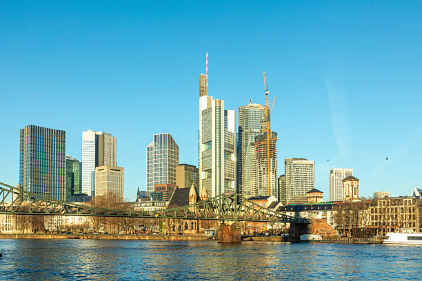scenic skyline of Frankfurt am Main with reflection in the river, Hesse, Germany