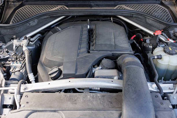istock Modern car engine bay with visible air intake, coolant tank and hoses 2240600088