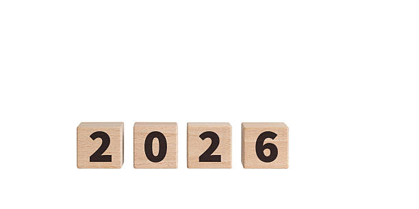 istock Wooden Blocks with 2026 Text on White Background for New Year Decor 2240604986
