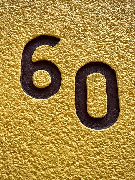 istock House Number 60 on Bright Yellow Wall (Mexico City, Mexico) 2240605419