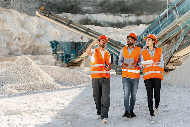istock Group of construction professionals collaborating on site inspection 2240612251
