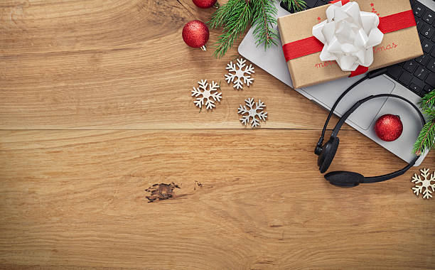 istock Christmas online shopping laptop with gift box 2240613829