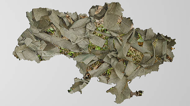 A map of Ukraine made from a camouflage net texture on a white background, themed around protection and defense