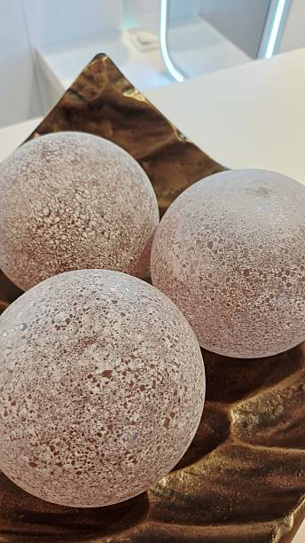 istock Decorative ornament. White round ball shaped decorative figurine. 2240615741