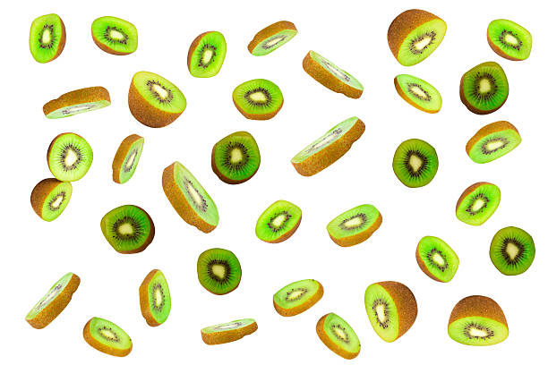 istock Orange half cut slices scattered and fallen on white background 2240622532