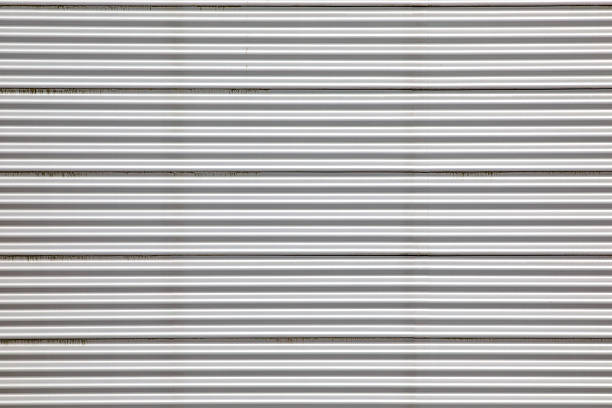 detail of a modern building facade showing corrugated aluminum wall panel