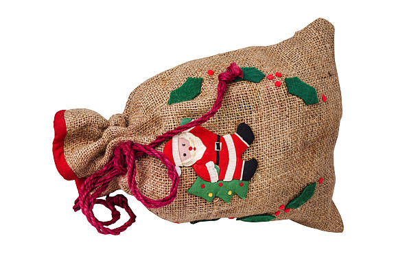 Closed New Years bag with gifts isolated on white background