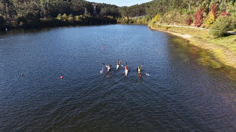 Kayakers paddling on pontillon do castro reservoir in pontevedra