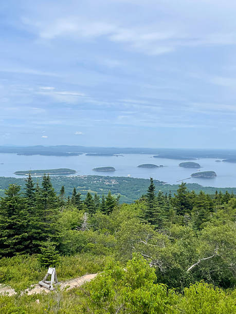 istock View of scattered islands surrounded by forested hills 2240631767