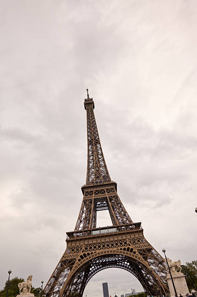 istock Eiffel tower standing tall under overcast skies, a famous paris landmark 2240632053