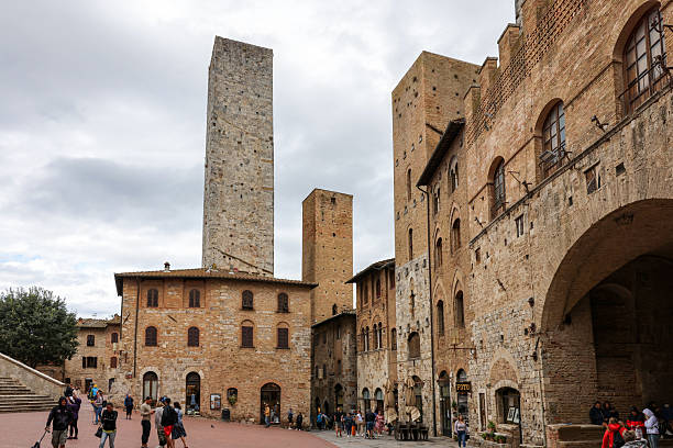 San Gimignano, Italy - Sept 17, 2022: Piazza Duomo in San Gimignano. Tuscany, Italy