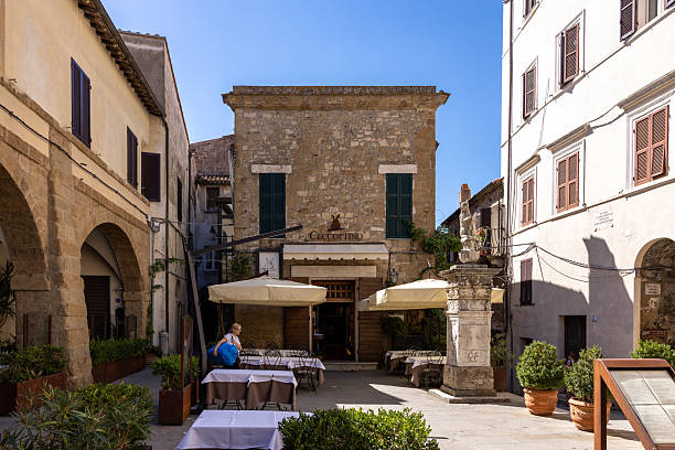 Pitigliano, Italy - September 13, 2022:  Pitigliano - the picturesque medieval town founded in Etruscan time on the tuff hill in Tuscany, Italy.