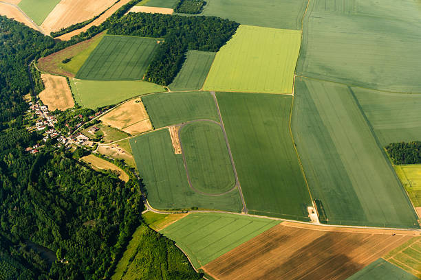 istock Aerial View of Patchwork Farmland Fields 2240634066