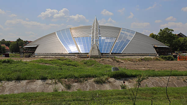 Indjija, Serbia - July 26, 2014: Construction Site of New Stadium Dome Structure Exterior Sport Venue Modern Building at Sunny Summer Day.
