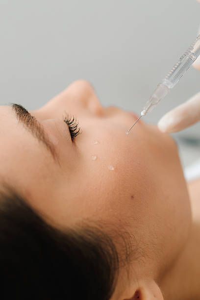 istock Facial biorevitalization to restore hydration and elasticity. Biorevitalization injections to enhance skin firmness and moisture balance. Biorevitalization injections provide deep moisturizing. 2240639463