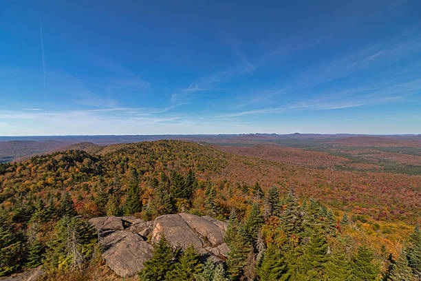 istock St. Regis Fire Tower views with peak fall foliage in daytime, Saranac Lake, Adirondack Mountains, Upstate NY 2240641958