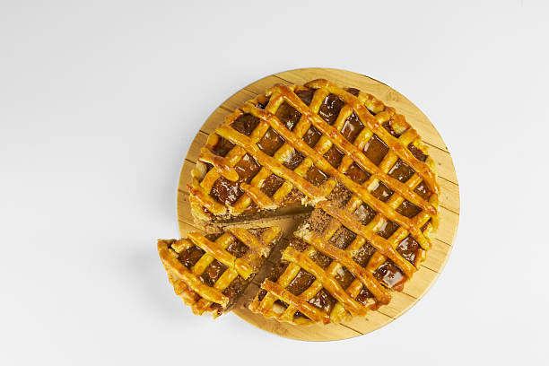 istock Apple pie, crispy pastry close-up on a white background 2240642724
