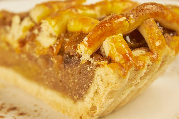 Apple pie, crispy pastry close-up on a white background