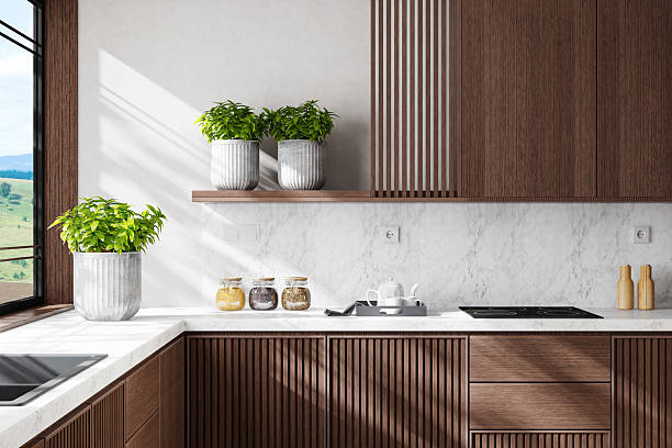 istock Modern Dual-Wall Kitchen with Dark Wood Cabinets and Marble Surfaces 2240643545