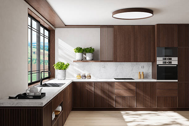 istock Modern Dual-Wall Kitchen with Dark Wood Cabinets and Marble Surfaces 2240644234