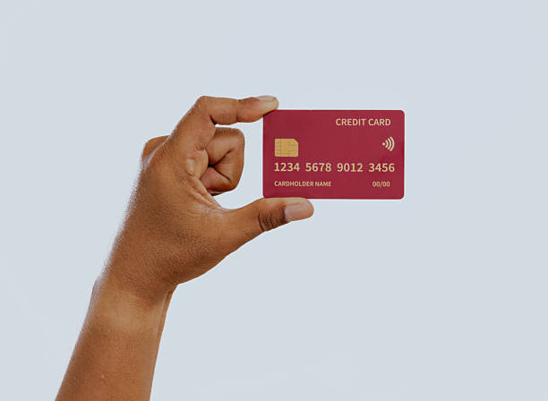 istock Hand holding credit card. 2240648867
