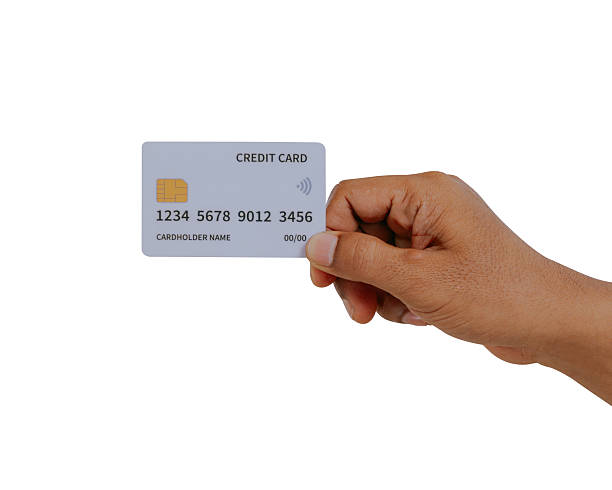 istock Hand holding a credit card. 2240648872