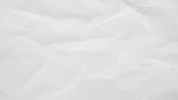 istock Abstract white crumpled and creased recycle paper texture background 2240650078