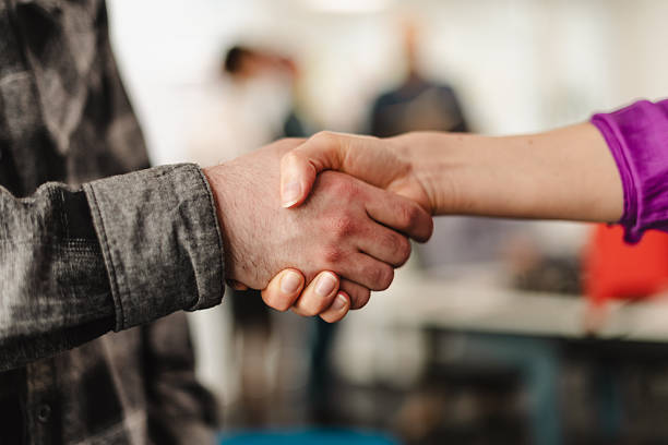 istock Business meeting highlights collaboration between professionals in bright office setting during mid-afternoon 2240650557