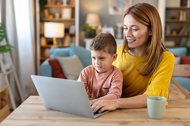 istock Joyful Learning Moment Between Mother and Child at Home 2240652118