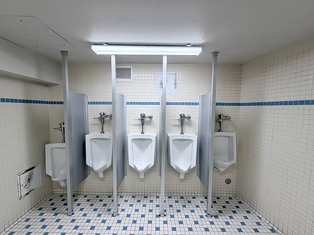 istock Urinals with Tiled Floors and Tiled Walls 2240652647