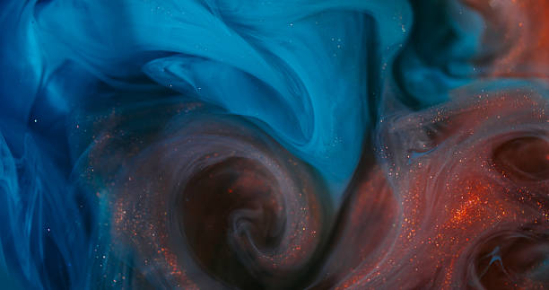 istock Paint mix shimmer cloud splash glitter underwater 2240675632