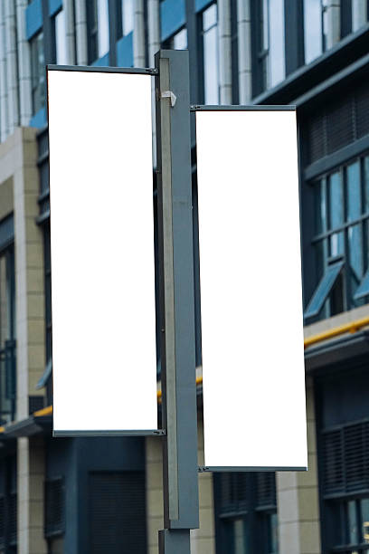 Large blank billboard on a street wall, banners with space to add your own text