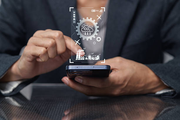 istock Person Using Smartphone to Monitor Carbon Dioxide Emissions Data 2240678070