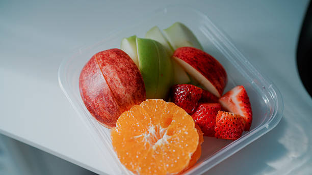 Box of assorted fruits prepared and placed on the table for a healthy diet